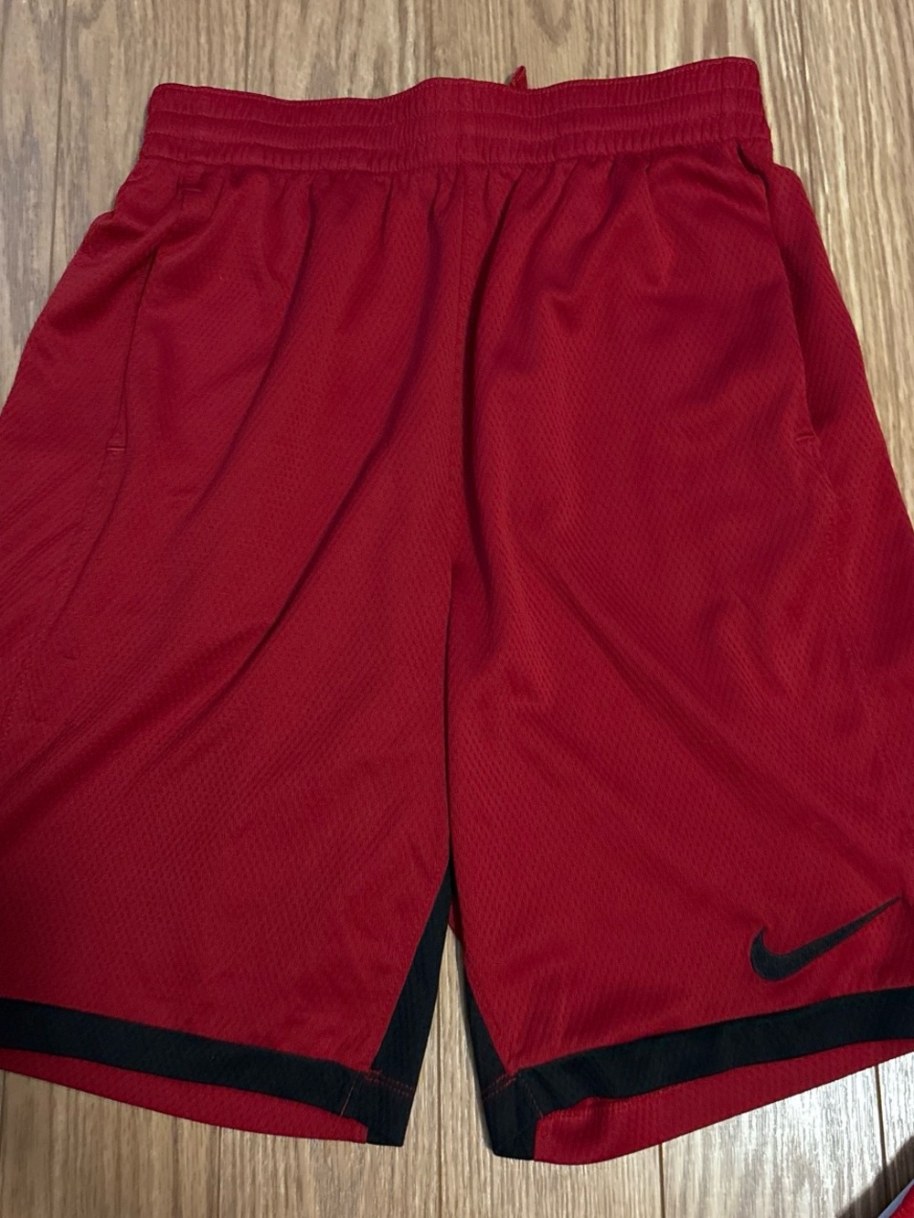 Nike boys Red Athletic Shorts with Black Trim